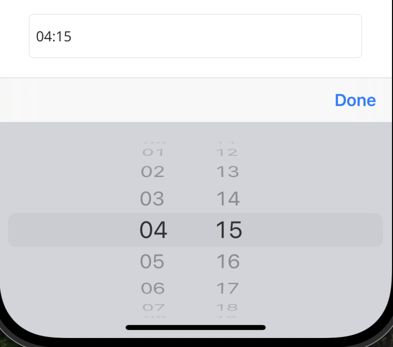 Screenshot of a TimePicker control on iOS.