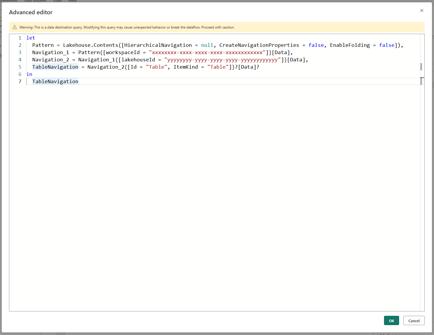 Screenshot of the Advanced editor window showing the M code for a data destination query with a warning banner.