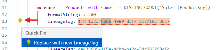 Screenshot of the TMDL view in the code editor showing a light bulb icon next to a squiggle, indicating available Code Actions like generating lineage tags.