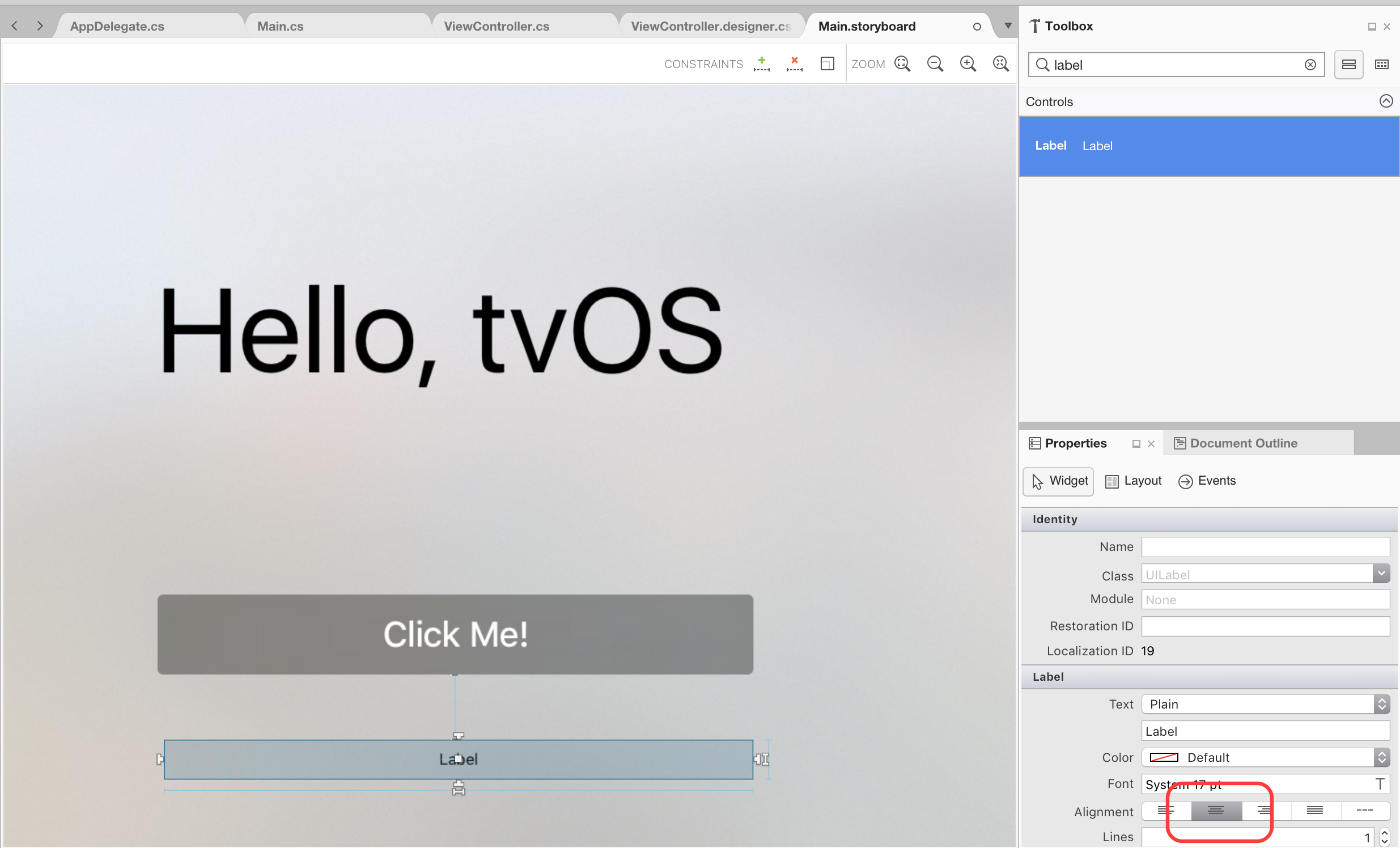 Drag another label under the button, size it to be the same width as the first label and set its Alignment to Center