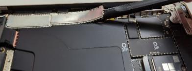 Screenshot that shows removing the T3 Shield Lid using a nylon spudger