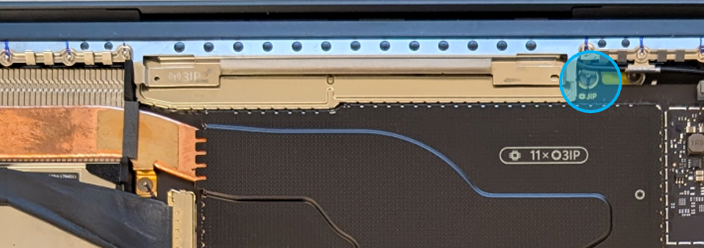 Screenshot that shows installing the motherboard screw in the Surface Laptop