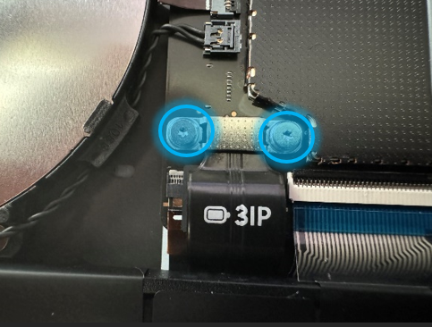 Screenshot that shows using a 3IP (Torx-Plus) driver to remove the two screws securing the battery FPC metal bracket.