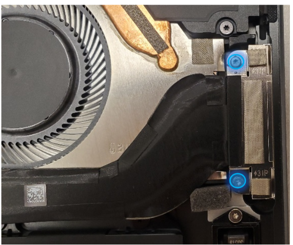 Screenshot that shows two Surface Connect port screws marked for removal beside magnetized connector