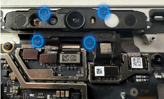 Screenshot that shows four microphone module screw locations before removal