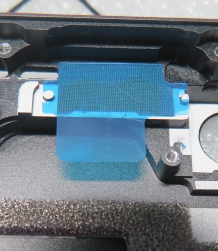 Screenshot that shows PSA liner holes aligned with enclosure pins for front camera adhesive