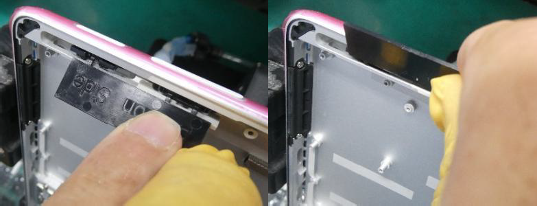 Screenshot that shows plastic tab partially bent front to back before breaking off the clip assembly.