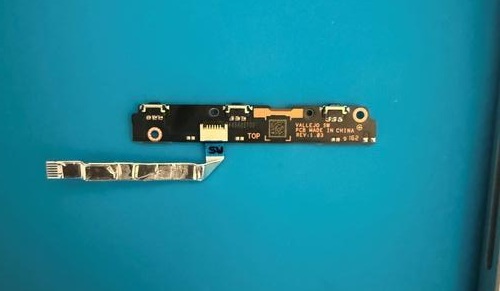 Photo that shows assembling the switch FPC into the ZIF connector on the button switch board.