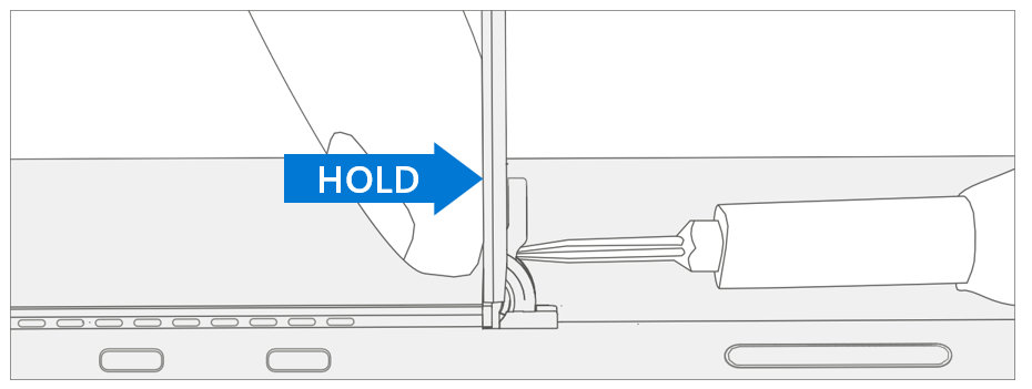 Diagram of a finger bracing the hinge as a Torx-plus driver removes one of the two hinge screws.
