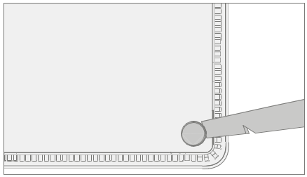 Screenshot that shows a foot being lifted with a spudger during removal.