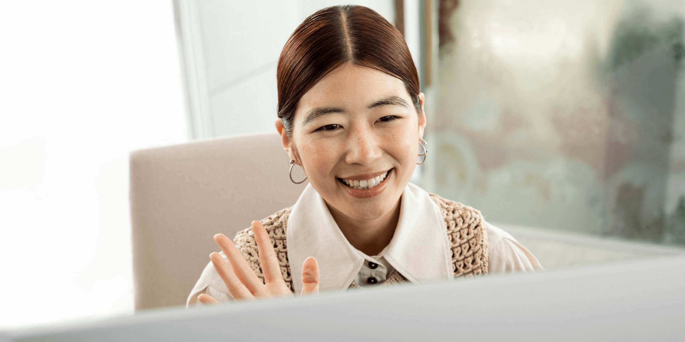 A person looking at a virtual Surface device.