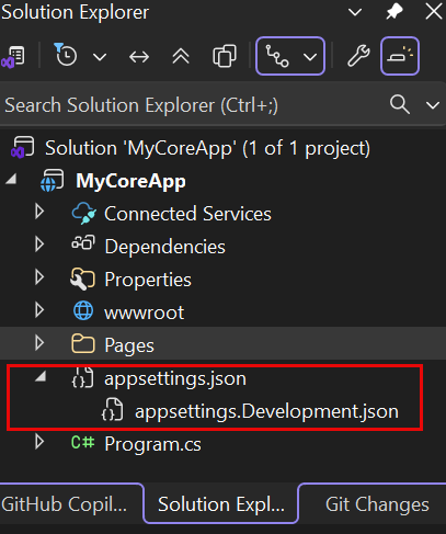 Screenshot shows appsettings.json selected and expanded, which exposes appsettings.Development.json, in the Solution Explorer in Visual Studio.