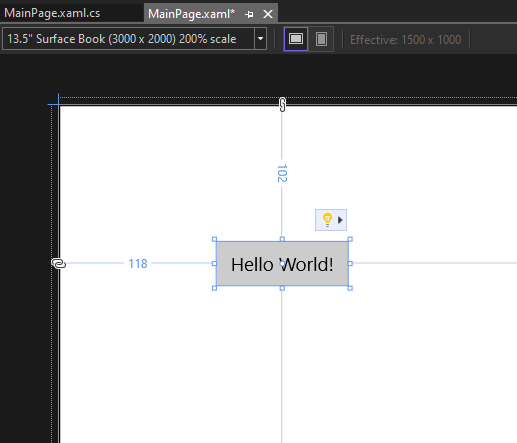 Zrzut ekranu przedstawiający przycisk sterujący na obszarze roboczym projektanta XAML z etykietą zmienioną na 'Hello World!'