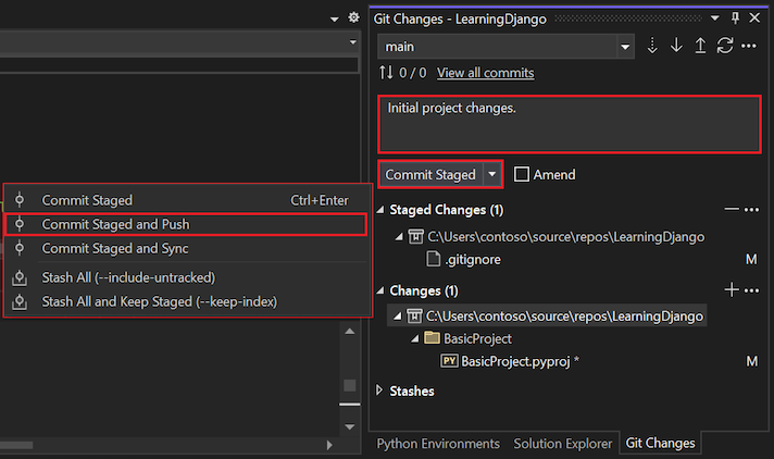 Skärmbild som visar hur du redigerar incheckningsmeddelandet och genomför och push-överför de mellanlagrade incheckningarna i fönstret Git-ändringar.